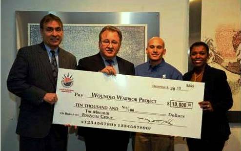Mischler Financial Group's Walt Mischler presenting a $10,000 check to the Illinois Chapter of Wounded Warrior Project (2010 library photo)